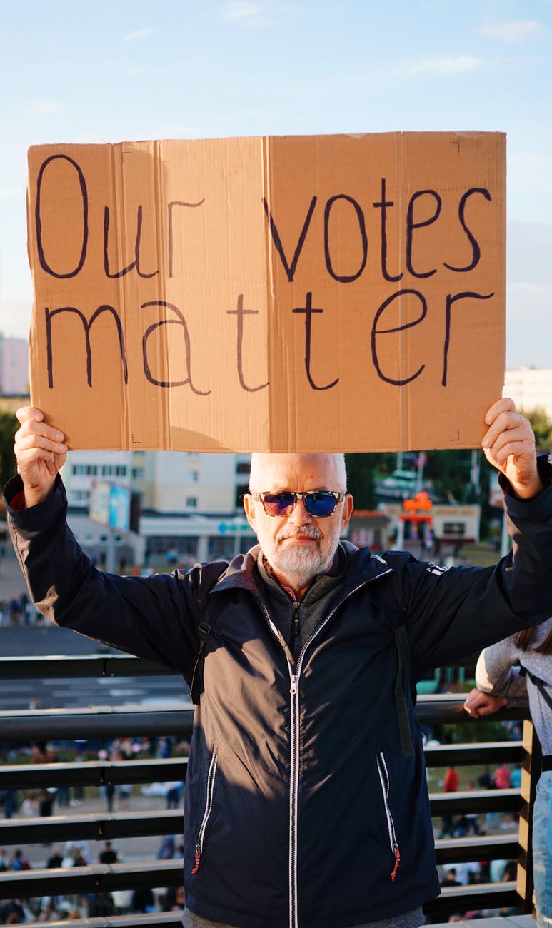 protester holding sign